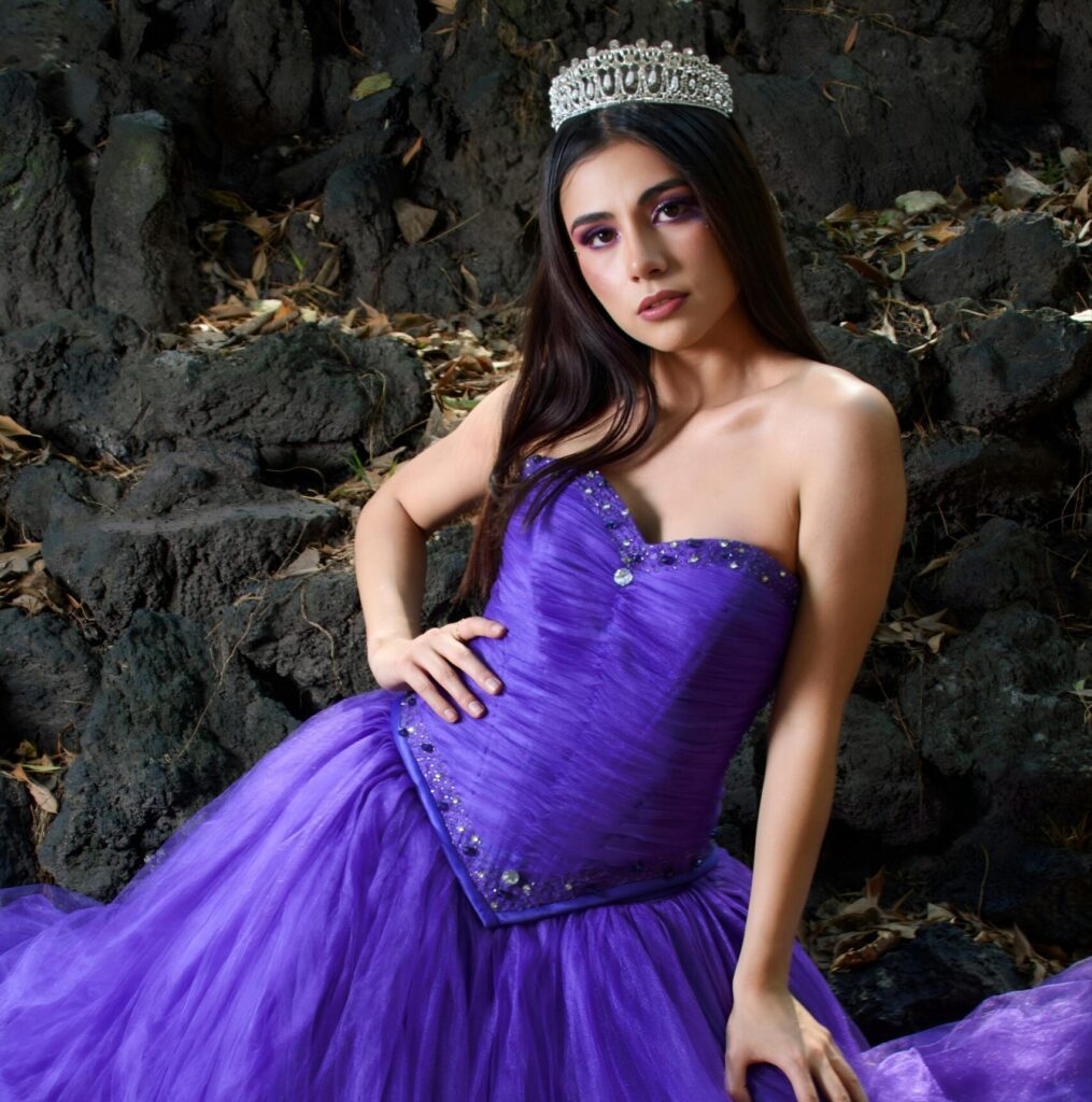 pexels photo 32428942 32428942 A stunning portrait of a woman in a purple gown and tiara, exuding elegance and grace.